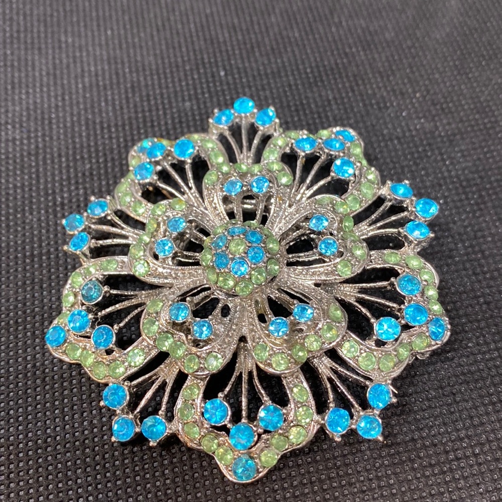 Large flower brooch blue green stones